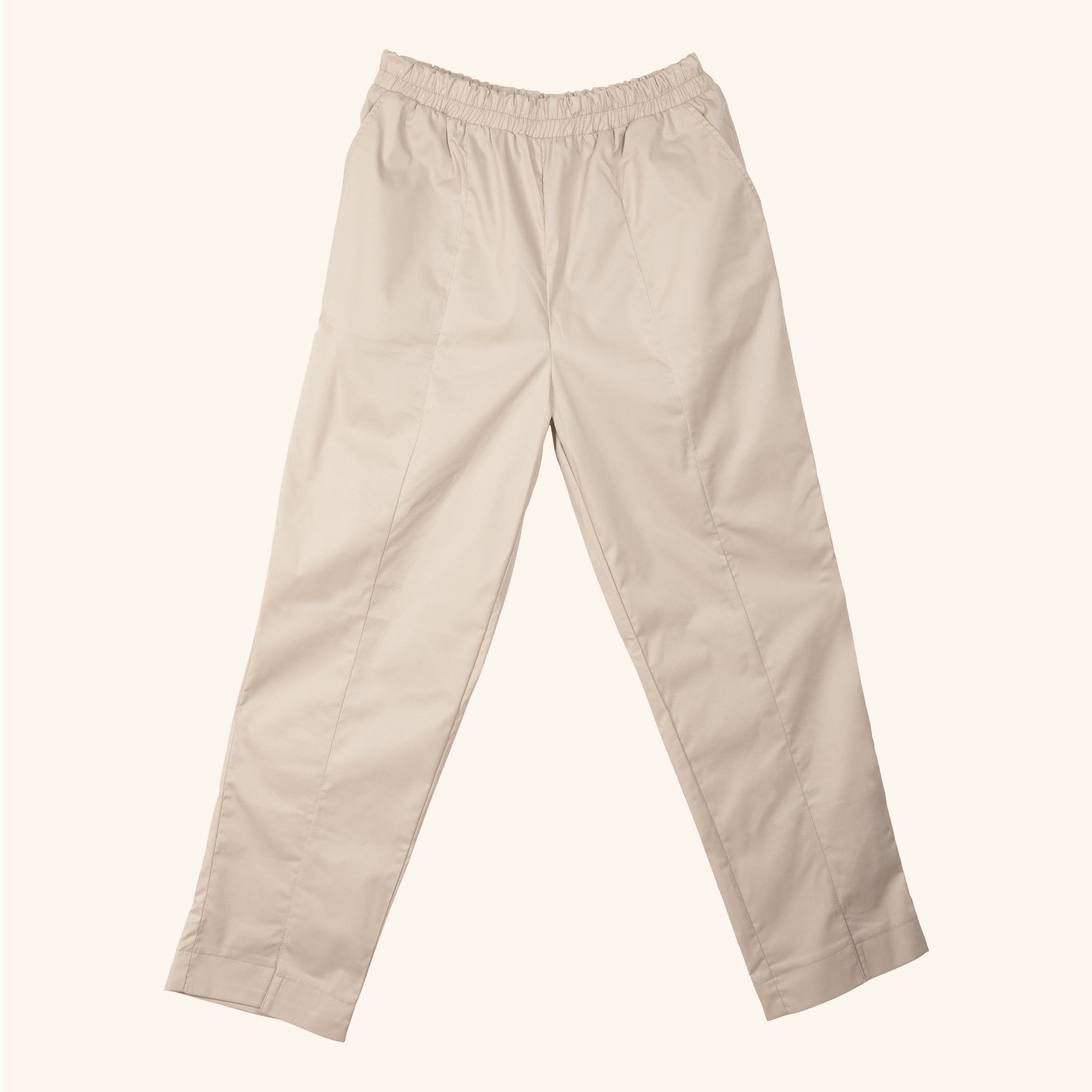 Pantalones beige de salón para estilistas de belleza