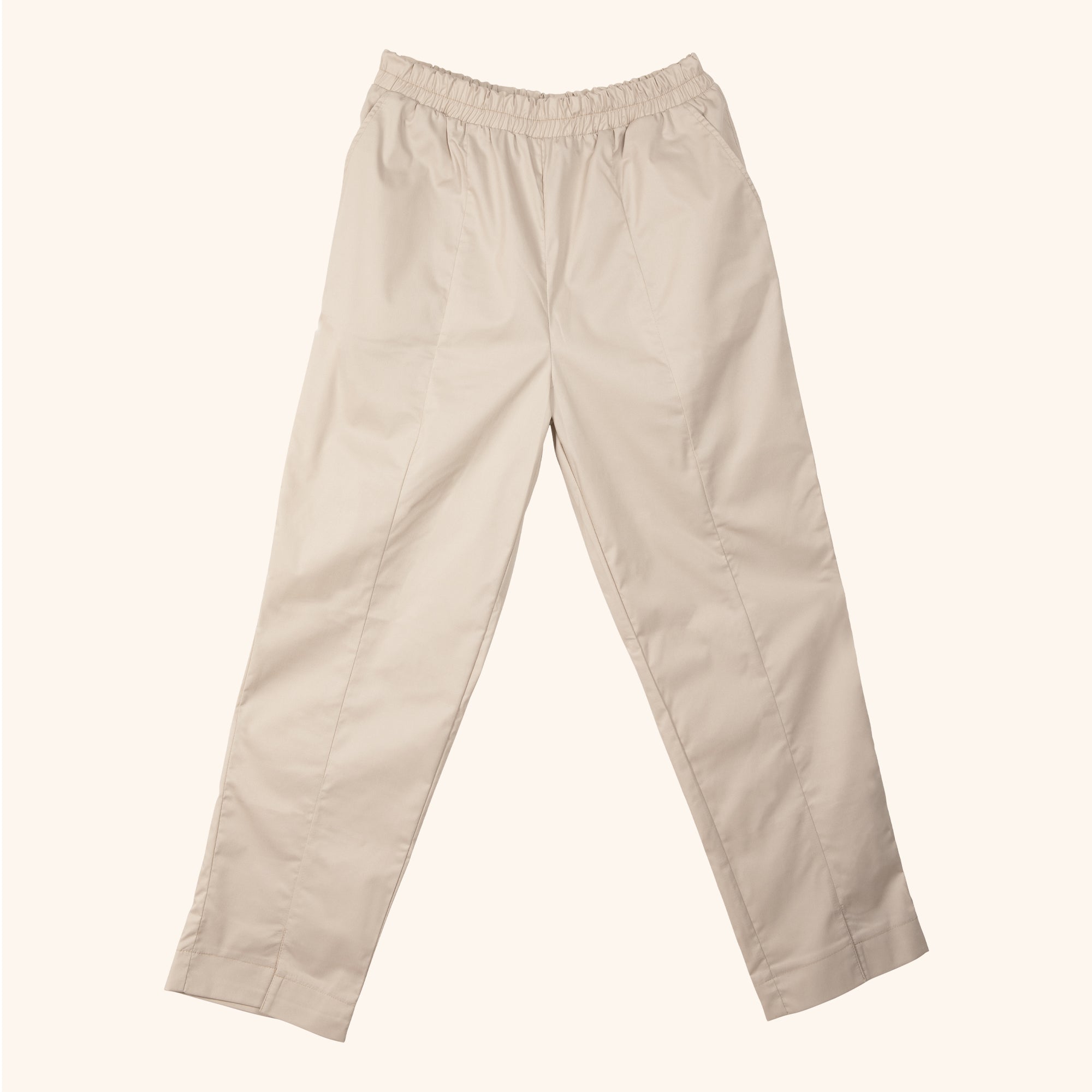 Pantalones beige de salón para estilistas de belleza