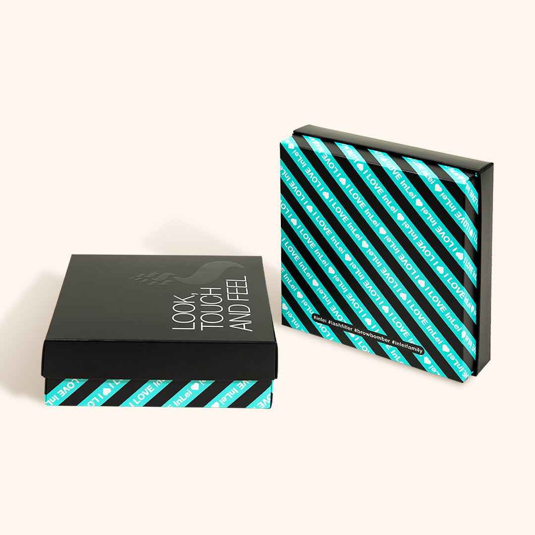 Caja de InLei® cerrada sobre una superficie lisa, mostrando el logotipo y diseño de la marca en su exterior.